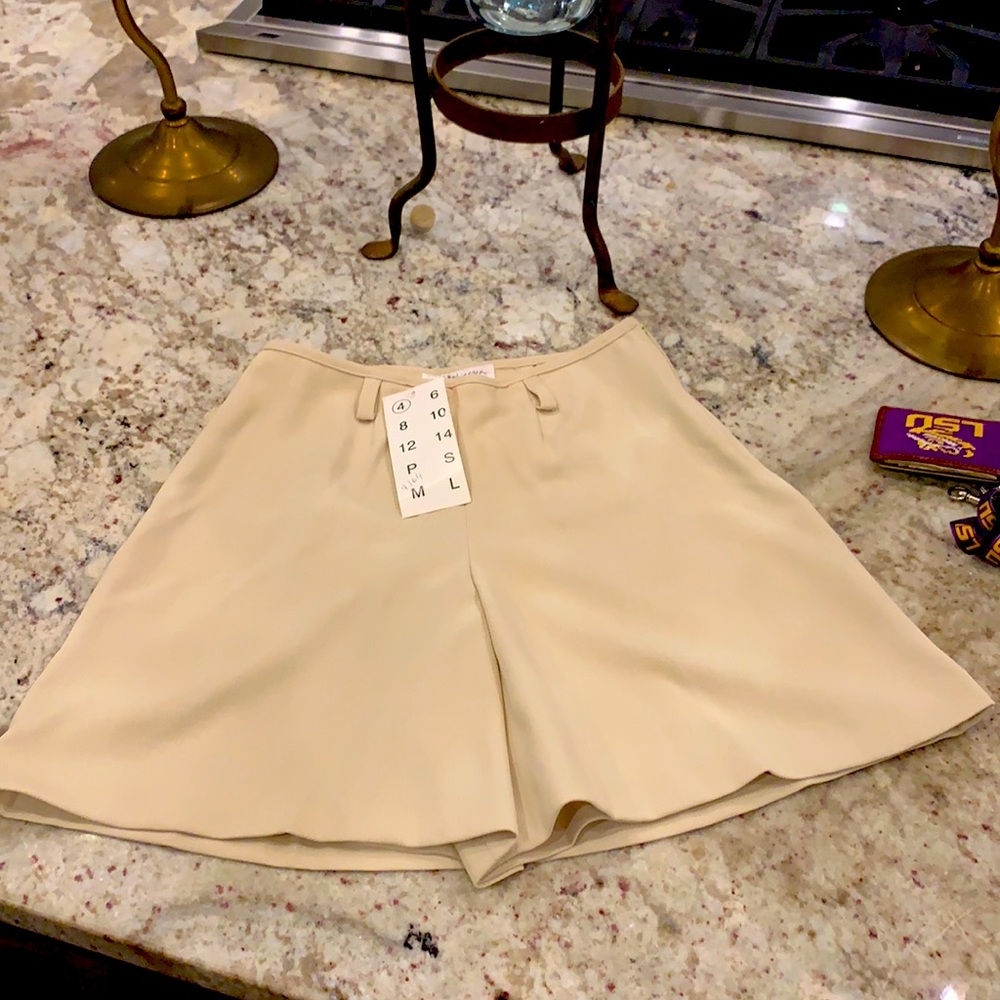 BIYA shorts on front side skirt on back .